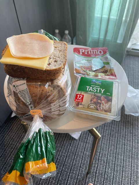 Image of bread, cheese, chicken as I prepare lunch.