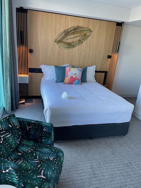 Inside my room, a bed, a lounge chair.  Total size about 20 square metres.